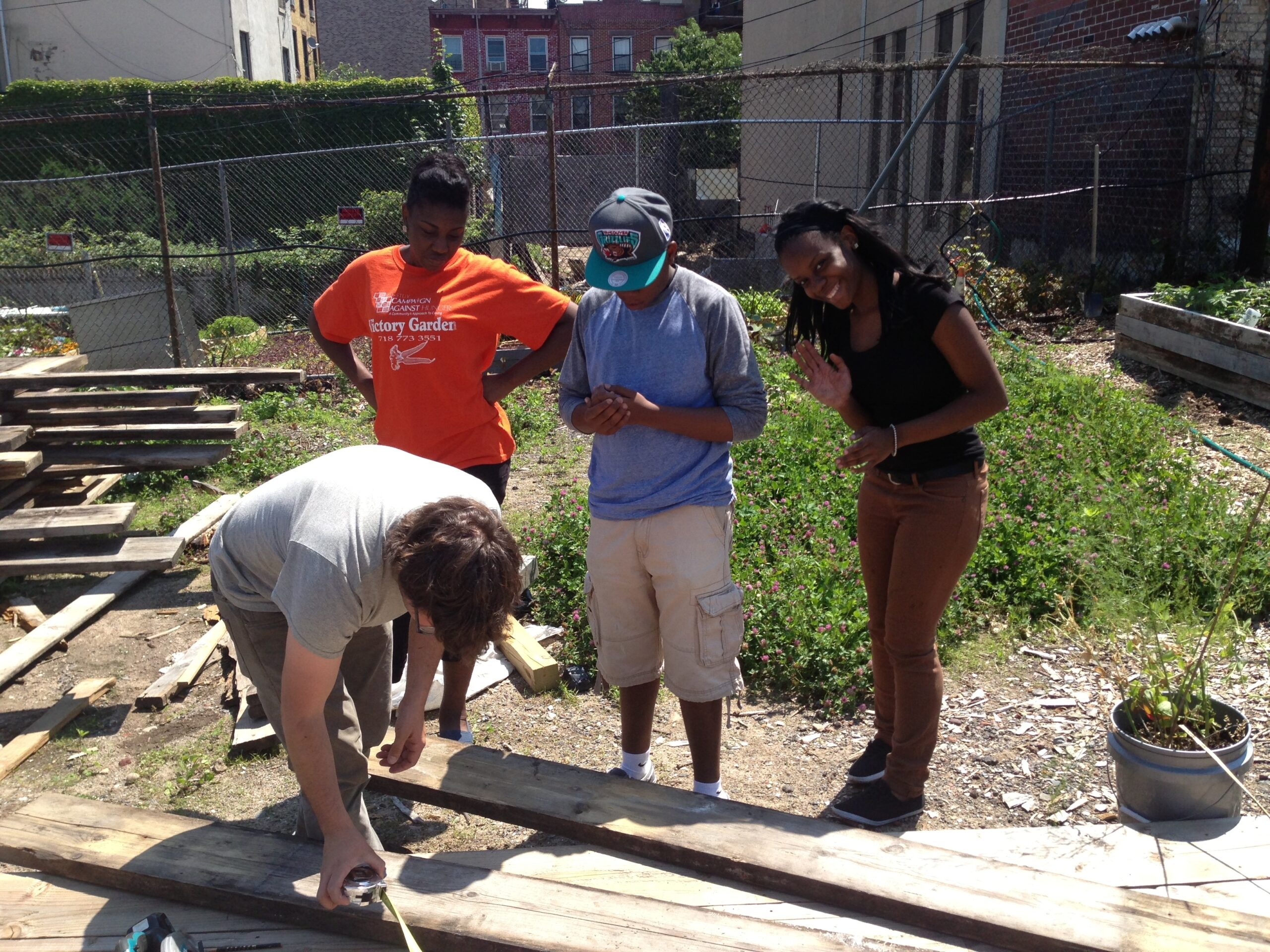 Across Generations: Green Teens Help with Seniors’ Home Planters